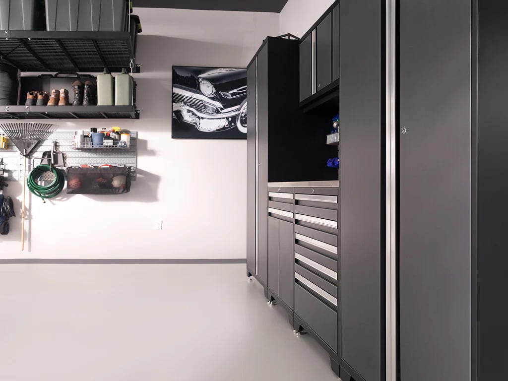 Side profile of black garage cabinets and slatwall