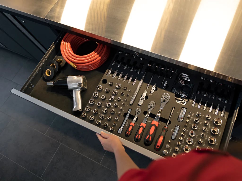 garage drawer open with tools visible 